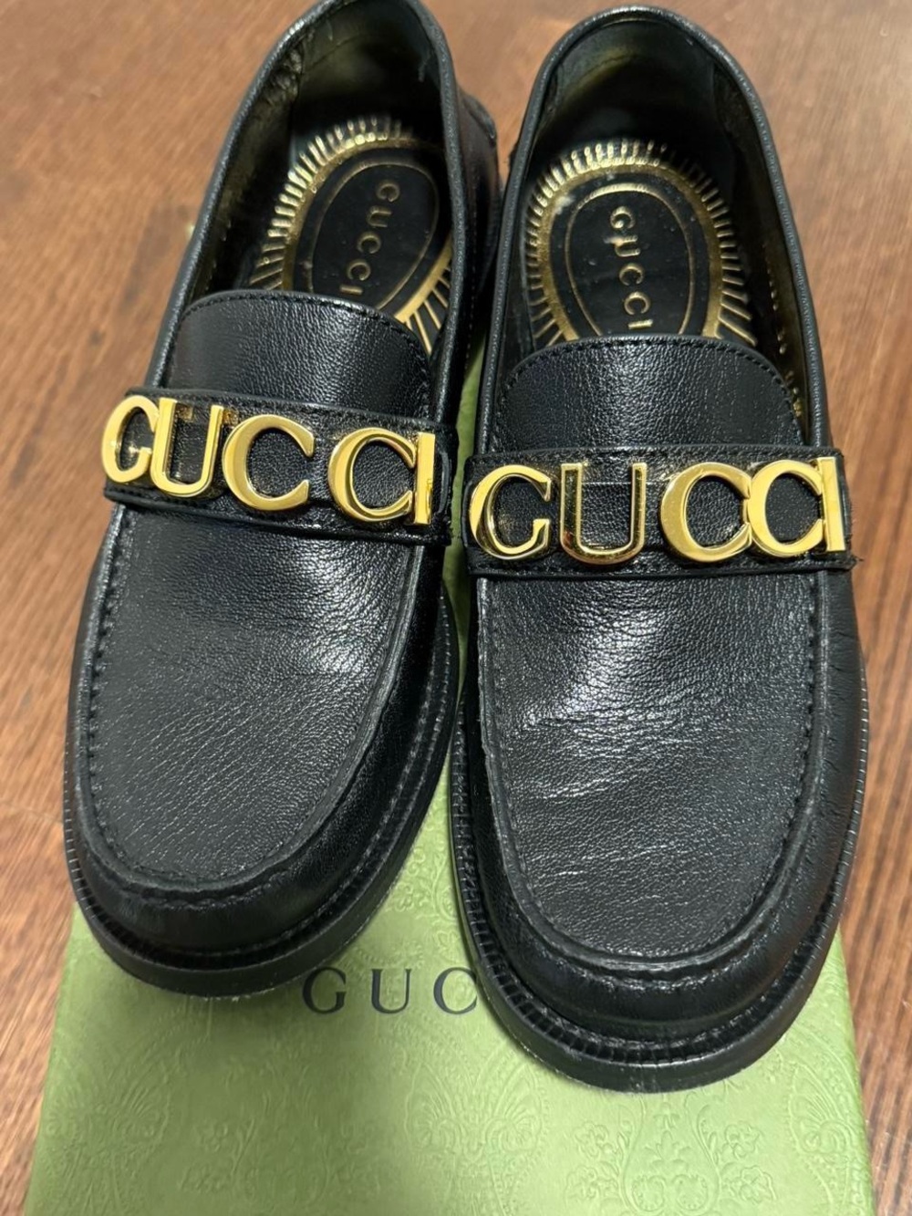Gucci Black Leather Men’s Loafers with Gold Logo Letters
